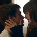 A man and a woman are about to kiss in a still from the movie The Idea of You